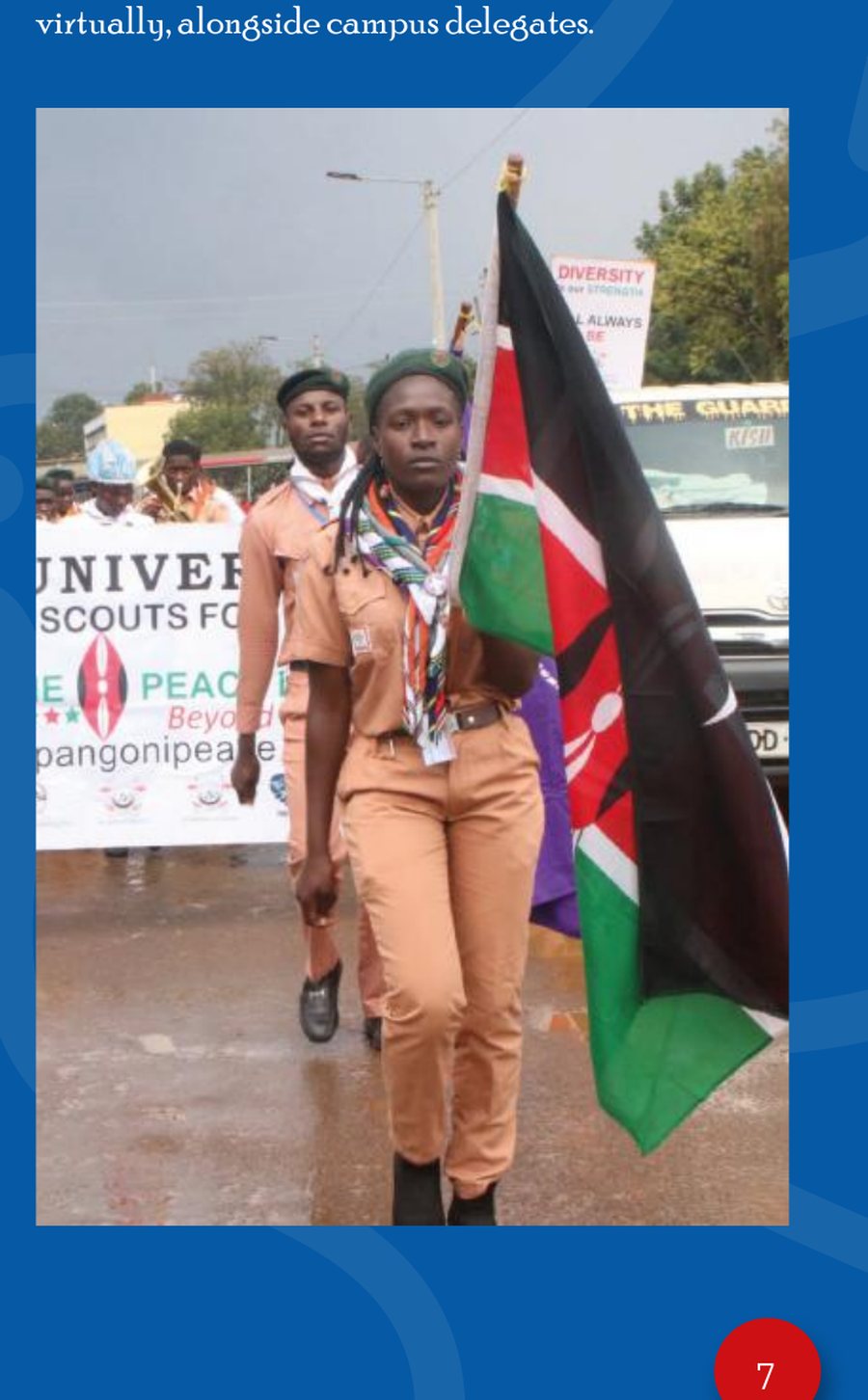 Scout carrying the Kenyan flag during a peace walk